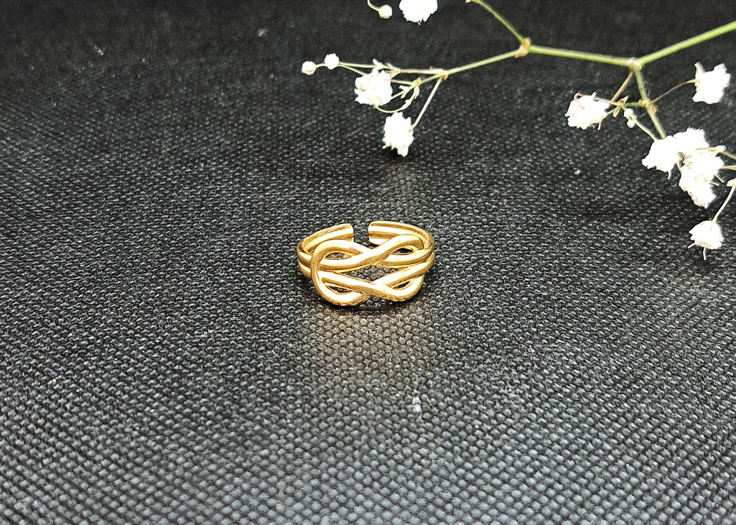 Bague "Infini" ajustable en acier inoxydable doré