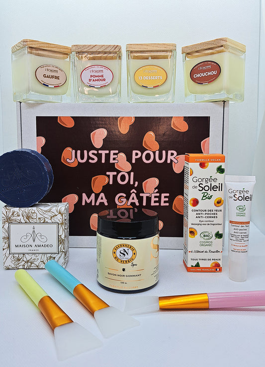 Une box pleine de soleil qui vient du sud de la France ! La Box Ma Gatée vous propose ce mois-ci de vous chouchouter avec une bougie en cire 100% végétale à la senteur gourmande surprise (chouchou, gaufre, pomme d'amour, ou 13 dessert), une crème contour des yeux anti cernes et anti poches bio confectionnée en Occitanie, un gommage naturel pour le visage au savon noir fabriqué en Corse, et pour une application professionnel, un pinceau à l'embout en silicone. Le tout pour 29.90€